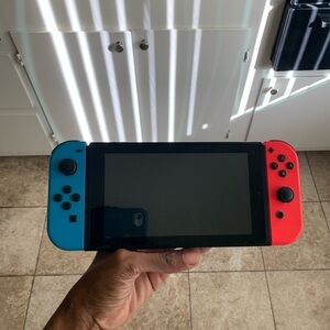 Nintendo Switch Console - Vibrant Red and Blue